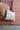 This contemporary throw pillow features supple, tufted cotton with an abstract line design. Includes polyfill insert. Machine Wash Warm Gentle Cycle, Do Not Bleach, Tumble Dry Low, Warm Iron If Needed, Trim Loose Threads After Washing or Hand Wash. Made from cotton and polyester.