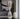 Introducing the 23" Galene Large Grey Hourglass, a stunning fusion of elegance and functionality that will elevate the aesthetic of any casual home decor. This exquisite piece, crafted entirely from high-quality glass, showcases a sleek and modern design that seamlessly fits into a variety of interior styles.