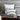 The Austin Allen James Wires Lumbar Pillow brings modern artistry to your space with its striking printed design on pure white linen. Measuring 12" x 20" with a 5" depth, this rectangular pillow is both stylish and functional, offering the perfect blend of contemporary elegance and cozy support. Its sleek design and premium materials make it an ideal accent for sofas, chairs, or beds, adding a touch of sophistication and visual intrigue to any decor.