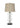 The Clear Seeded Transitional Table Lamp combines classic design with modern elegance, featuring a 33-inch tall base crafted from clear seeded glass for a textured, sophisticated look. Ideal for living rooms, bedrooms, or offices, this lamp accommodates up to 100 watts, providing ample illumination while enhancing your decor.