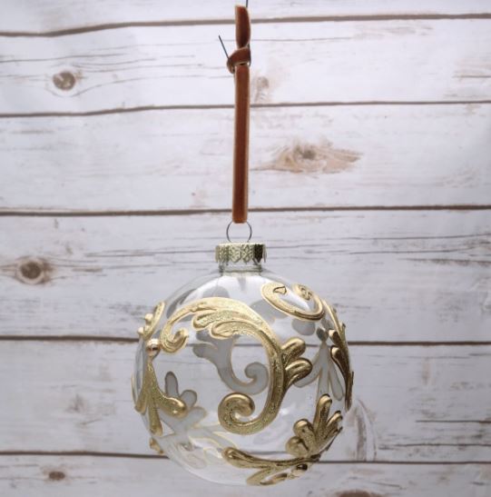 Enhance your holiday decor with our 100mm Glass Ball Ornament in Gold/Clear. This elegant ornament features a beautiful blend of clear glass and shimmering gold accents, creating a sophisticated look that catches the light beautifully.