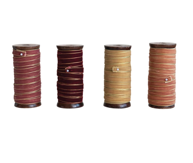 Add a touch of elegance to your crafts and décor with our 10 Yard Velvet Ribbon on Wood Spool. This luxurious ribbon features a rich velvet texture and metallic edges that catch the light beautifully, adding a sophisticated sheen to any project.