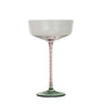 This 10 oz. champagne glass is a celebration in itself, featuring a clear bowl that sits atop a distinctively colored stem in pink and a green base.