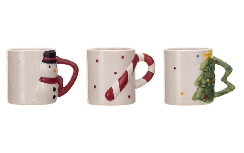 This set of 3 stoneware holiday mugs with shaped handles is a festive and fun way to enjoy drinks and celebrate the season. The mugs come in three styles, each with a different handle and color, and measure 4.75 inches in length, 3.25 inches in width, and 3.5 inches in height.