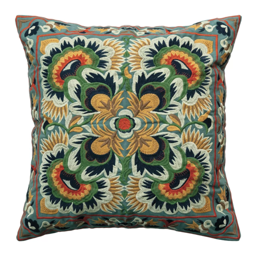 This Multicolor Embroidered Cotton Pillow is a celebration of global craftsmanship and design. Measuring 18 inches square, it's adorned with an intricate embroidery that draws inspiration from Scandinavian, Boho, and global styles. The vivid hues dance across the cotton fabric, inviting the eye and the hand to explore its textured surface