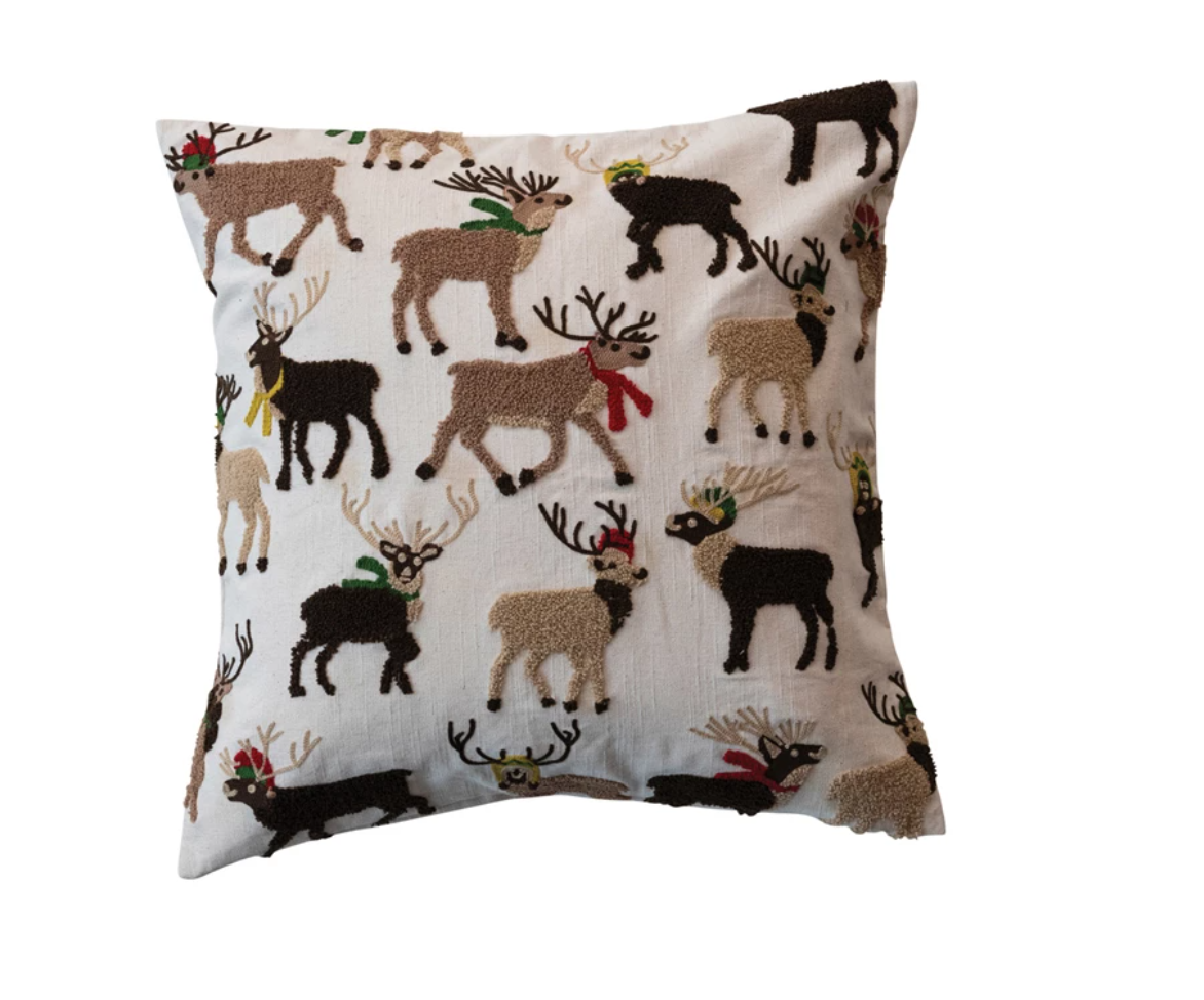 This 20-inch square cotton slub pillow is a charming addition to holiday decorations, showcasing a tufted and embroidered reindeer on a vibrant multicolor background. The cotton cover has a rustic texture that complements the festive design, while the polyester fill provides plush support, making it both a decorative and comfortable choice.