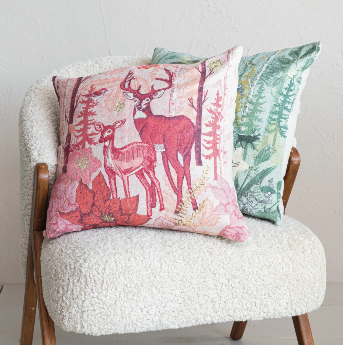 The dual-sided design features a chambray back, providing two versatile looks in one. The cotton blend cover is soft yet durable, while the polyester fill ensures the pillow retains its shape and provides ample support. With its rich colors and elegant embroidery, this pillow is a sophisticated addition to any space, inviting admiration and comfort in equal measure. Add a touch of luxury to the living room or bedroom with this stylish pillow that effortlessly combines beauty and functionality. A visual symp