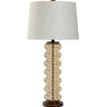 The 33" Opulence Glass Transitional Table Lamp exudes timeless elegance with its elongated glass base and sleek silhouette. Perfectly blending classic and contemporary styles, this lamp adds sophistication to any space. Its generous height and versatile design make it ideal for console tables, bedside tables, or living room accents, providing both functional lighting and a statement piece for your decor.