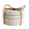 This set of four marble coasters is a harmonious blend of functionality and artistry. The white marble provides a cool, smooth surface, while the brass tree inlay adds a unique, decorative touch.