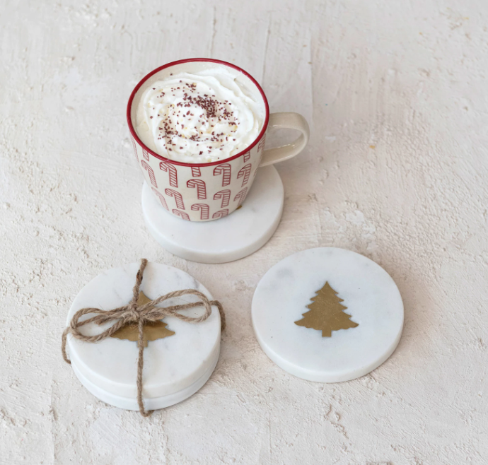 This set of four marble coasters is a harmonious blend of functionality and artistry. The white marble provides a cool, smooth surface, while the brass tree inlay adds a unique, decorative touch.