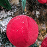 Add a splash of color to your decor with our 4" Red Soft Ball Hanging Ornament. This vibrant ornament features a plush texture and a rich red hue, making it a perfect accent for any space. Ideal for hanging from ceilings, trees, or decorative displays, it brings a playful yet elegant touch to your home