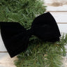 Add a touch of elegance to your decor with our 6" Black Velvet Bow with Clip. This luxurious bow features a soft, rich velvet texture that adds sophistication to any arrangement.