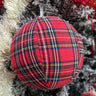 Embrace the festive spirit with our 8" Large Red and Green Plaid Ball Hanging Ornament. This stunning ornament features a bold plaid design, combining vibrant reds and greens that instantly add a cozy, traditional touch to your decor.