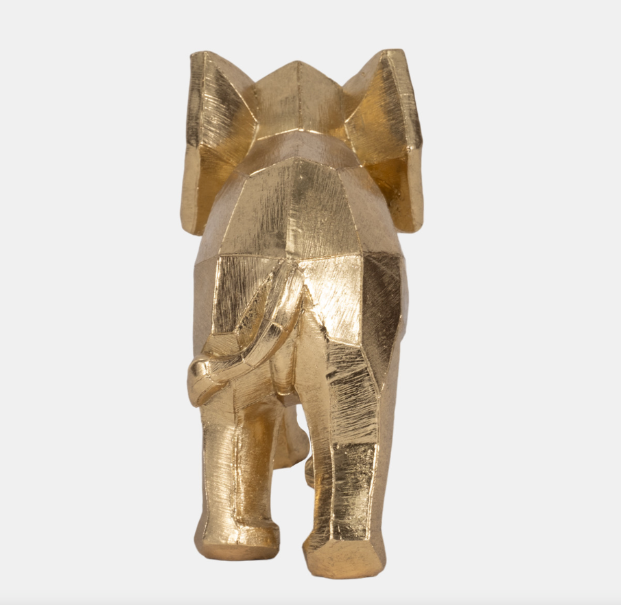 The Geometric Elephant is crafted from durable polyresin, giving it a refined metallic gold sheen that catches the light beautifully. Its unique geometric shape combines elegance with a modern flair, making it a versatile addition to both boho and glam interiors.