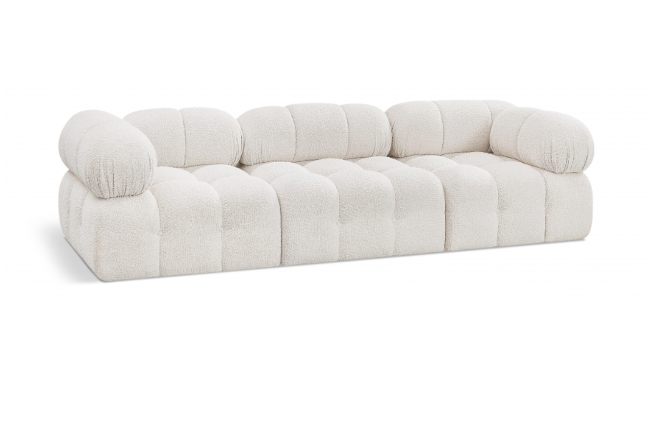 Elegant and eye-catching, the stunning cream boucle fabric Ames Modular Sofa from Meridian Furniture is the perfect addition to any space.

Rich Cream Boucle Fabric
Modular To Create Infinite Configurations
Easily Attach Using Included Latches
Contemporary Design