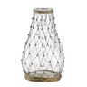 With its graceful silhouette and rustic texture, this teardrop vase is a unique accent for any modern space. It is a large, smoothly curved clear glass vessel wrapped completely in black metal wire. Willow accents add to this piece’s elegant yet natural decorative effect.