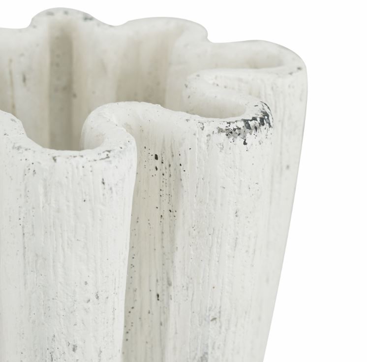 The 12" Antique Cement Vase exudes rustic charm with its weathered finish and timeless design. Perfect for displaying florals or as a standalone accent, this sturdy cement vase adds texture and character to any space, blending seamlessly with both modern and vintage decor.