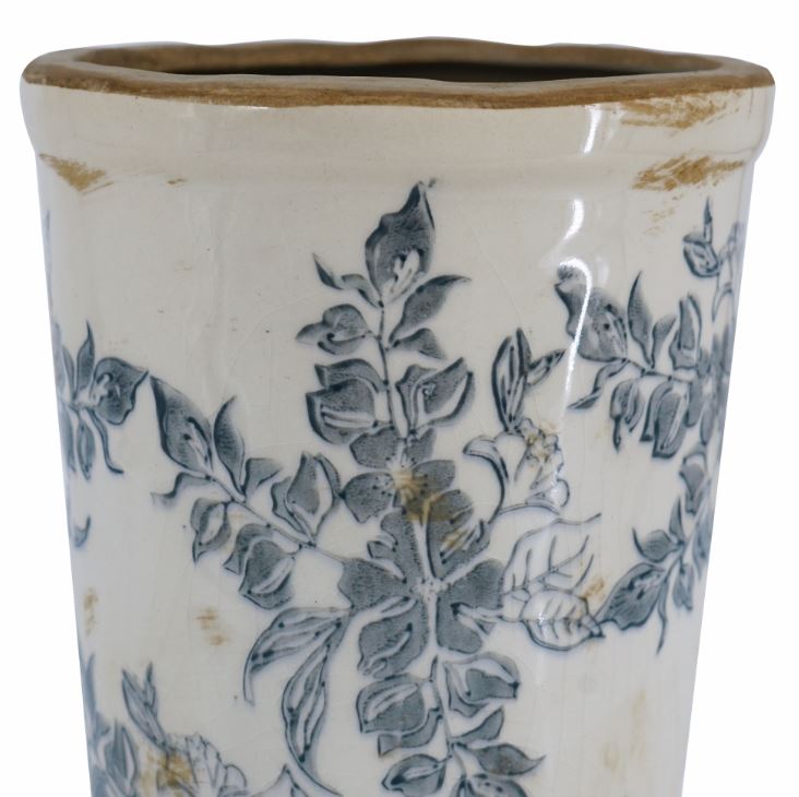 The 9.5 inch&nbsp;Antique Ceramic Flower Vase&nbsp;brings vintage charm to any space with its classic design and beautifully aged finish. Perfect for showcasing fresh blooms or as a standalone decorative piece, this 12-inch vase adds timeless elegance and character to your home decor.