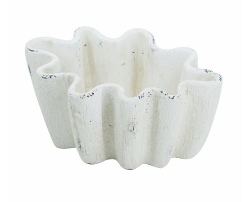 The 5" Antique Cement Vase is a charming decorative piece that brings rustic elegance to your space. With its aged finish and sturdy cement construction, this vase offers timeless appeal, perfect for displaying small floral arrangements or as a standalone accent. Its compact size makes it versatile for use on shelves, tables, or mantels, adding a touch of understated sophistication to any decor.