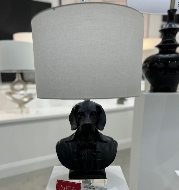 Illuminate your space with a touch of playful elegance with the Beauchamp Whimsical Dog Bust Table Lamp. This unique lamp features a charming dog bust design, adding a whimsical and sophisticated flair to your decor.