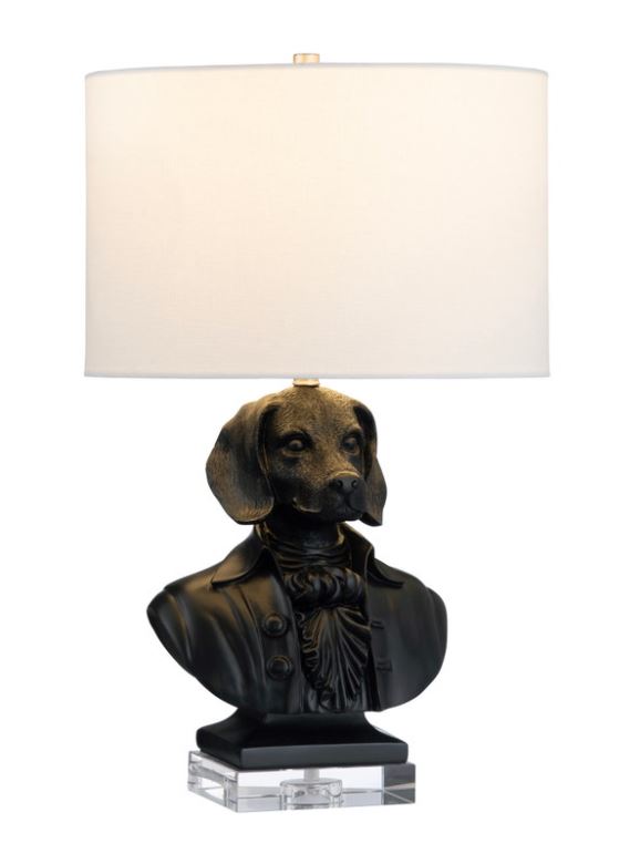 Illuminate your space with a touch of playful elegance with the Beauchamp Whimsical Dog Bust Table Lamp. This unique lamp features a charming dog bust design, adding a whimsical and sophisticated flair to your decor.