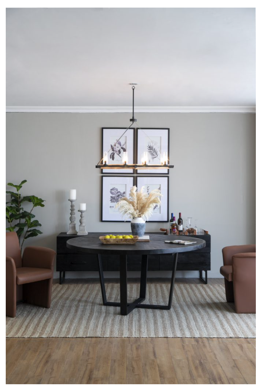 This black dining table is certain to add character to your space with its rounded surface and uniquely modern overlapping cross-legged frame. Measuring a generous 63W x 31H, it can comfortably seat five people, meaning you can bring a stylish flair to your family dinner or gatherings. The muted colorway of the tabletop and frame ensures that the table can complement almost all interior styles.