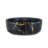 Handcrafted from 100% high-quality porcelain by talented artisans, this shallow bowl showcases a round silhouette and a smooth white hue with gold flashes. Measuring 7D x 2.5H, this bowl also offers versatility. Use it to serve salad, pasta, rice, desserts, and much more. The neutral color of the bowl enables it to effortlessly slot into your existing dinnerware set
