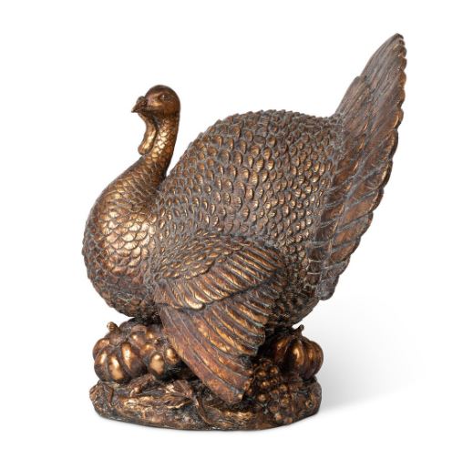 Elevate your holiday gatherings with our stunning Bronze Turkey Centerpiece, measuring 14"L x 12.5"W x 16"H. This beautifully designed piece adds a touch of elegance and warmth to your table setting, making it the perfect focal point for Thanksgiving or fall celebrations.