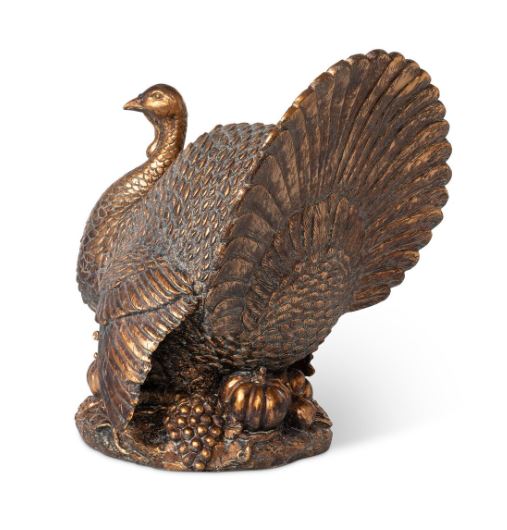 Elevate your holiday gatherings with our stunning Bronze Turkey Centerpiece, measuring 14"L x 12.5"W x 16"H. This beautifully designed piece adds a touch of elegance and warmth to your table setting, making it the perfect focal point for Thanksgiving or fall celebrations.