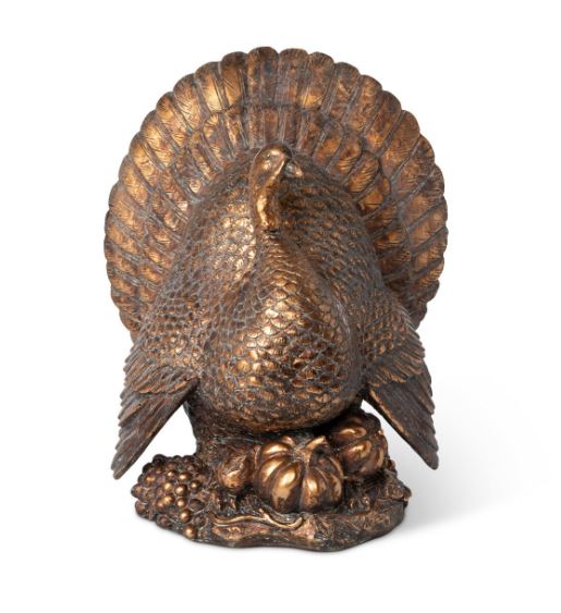 Elevate your holiday gatherings with our stunning Bronze Turkey Centerpiece, measuring 14"L x 12.5"W x 16"H. This beautifully designed piece adds a touch of elegance and warmth to your table setting, making it the perfect focal point for Thanksgiving or fall celebrations.