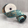 Elevate your decor projects with our Teal Burn Out Velvet Taupe Acanthus Ribbon. Measuring 2.5" wide and 10 yards long, this exquisite ribbon features an elegant acanthus design with a striking contrast of teal and taupe.