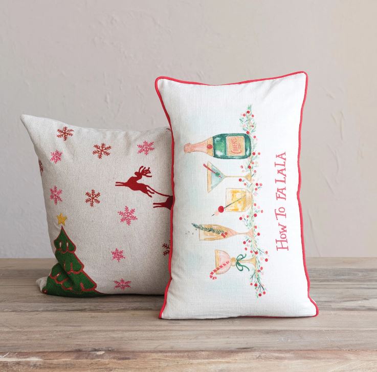 This lumbar pillow is a cheerful celebration of the season, featuring a multicolored "How to FA LA LA" print that's sure to bring joy. The bright embroidery and bold red piping add a touch of holiday spirit, while the all-cotton construction offers both comfort and durability. Whether it's brightening up a sofa or offering support in a reading chair, this pillow is a delightful way to infuse every space with festive charm.