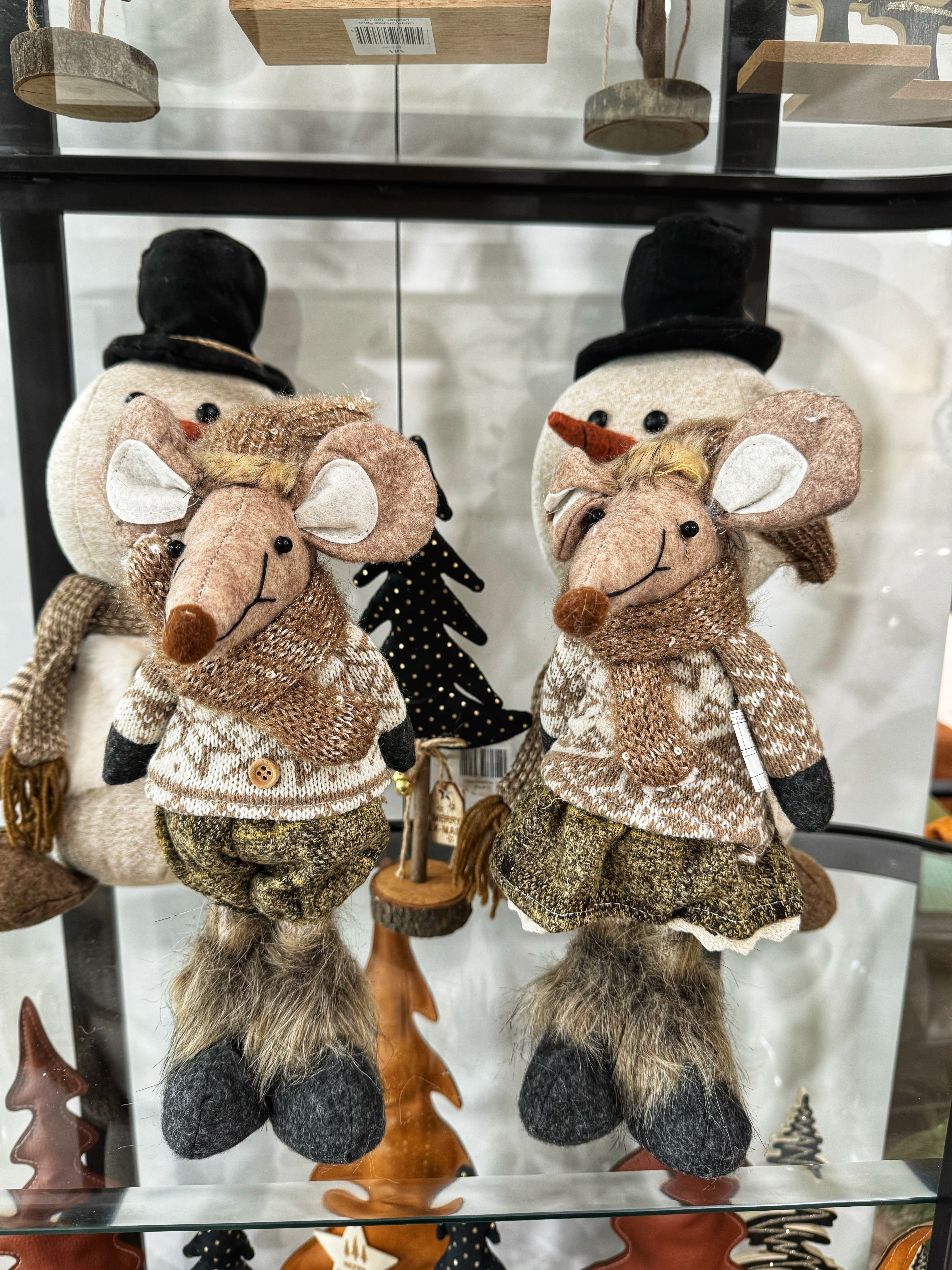 Each mouse stands gracefully, bringing a delightful touch of whimsy to your holiday decor. Perfect for adorning your mantel, shelves, or tabletops, these festive mice add a playful spirit to any setting. With their intricate details and cozy colors, they’re sure to become beloved accents during your holiday celebrations. Bring a bit of magic and cheer to your home with these delightful Christmas companions!