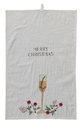 This set of two cotton slub printed tea towels features a festive and fun touch to the kitchen. The towels have a rectangle shape and a slub texture, giving them a casual and cozy feel. They come in two styles, each with a different holiday cocktail, saying, and loop in multicolor, with sayings like "Merry Christmas" and "How to Falala".