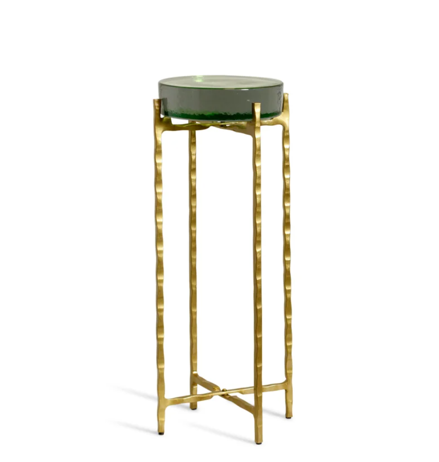 Standing at 23 inches tall with a sleek 9-inch diameter, this stunning drink table combines playful design with sophisticated materials to create an eye-catching accent piece.