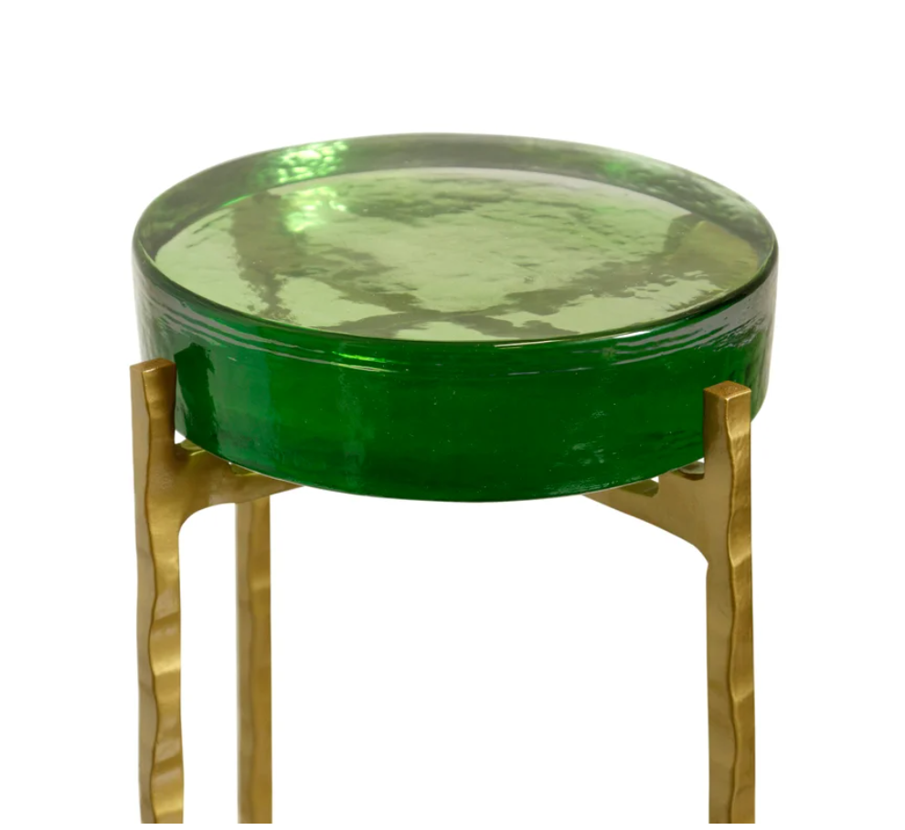 Standing at 23 inches tall with a sleek 9-inch diameter, this stunning drink table combines playful design with sophisticated materials to create an eye-catching accent piece.