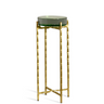 Standing at 23 inches tall with a sleek 9-inch diameter, this stunning drink table combines playful design with sophisticated materials to create an eye-catching accent piece.