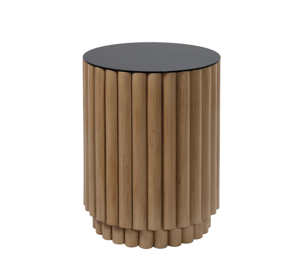  Crafted from natural pine wood, this exquisite piece boasts a unique fluted design that adds texture and depth to any room. The rich, warm tones of the pine wood are beautifully complemented by a sleek black glass table top, creating a striking contrast that enhances the table's elegant aesthetic.