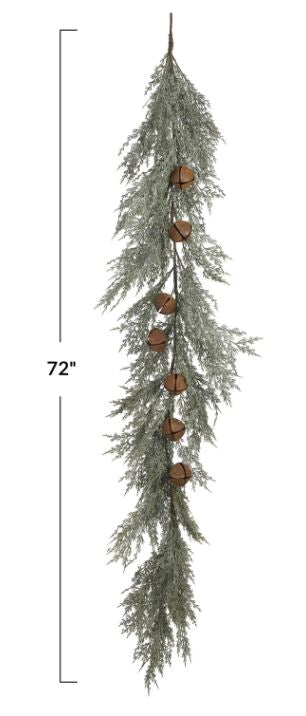 Bring a touch of rustic charm and natural beauty to the holiday décor or year-round displays with this delightful faux cedar garland with rust bells. Realistic faux cedar fronds in a lush green color create a natural foundation, while the decorative metal bells with a rust finish add a touch of vintage charm.