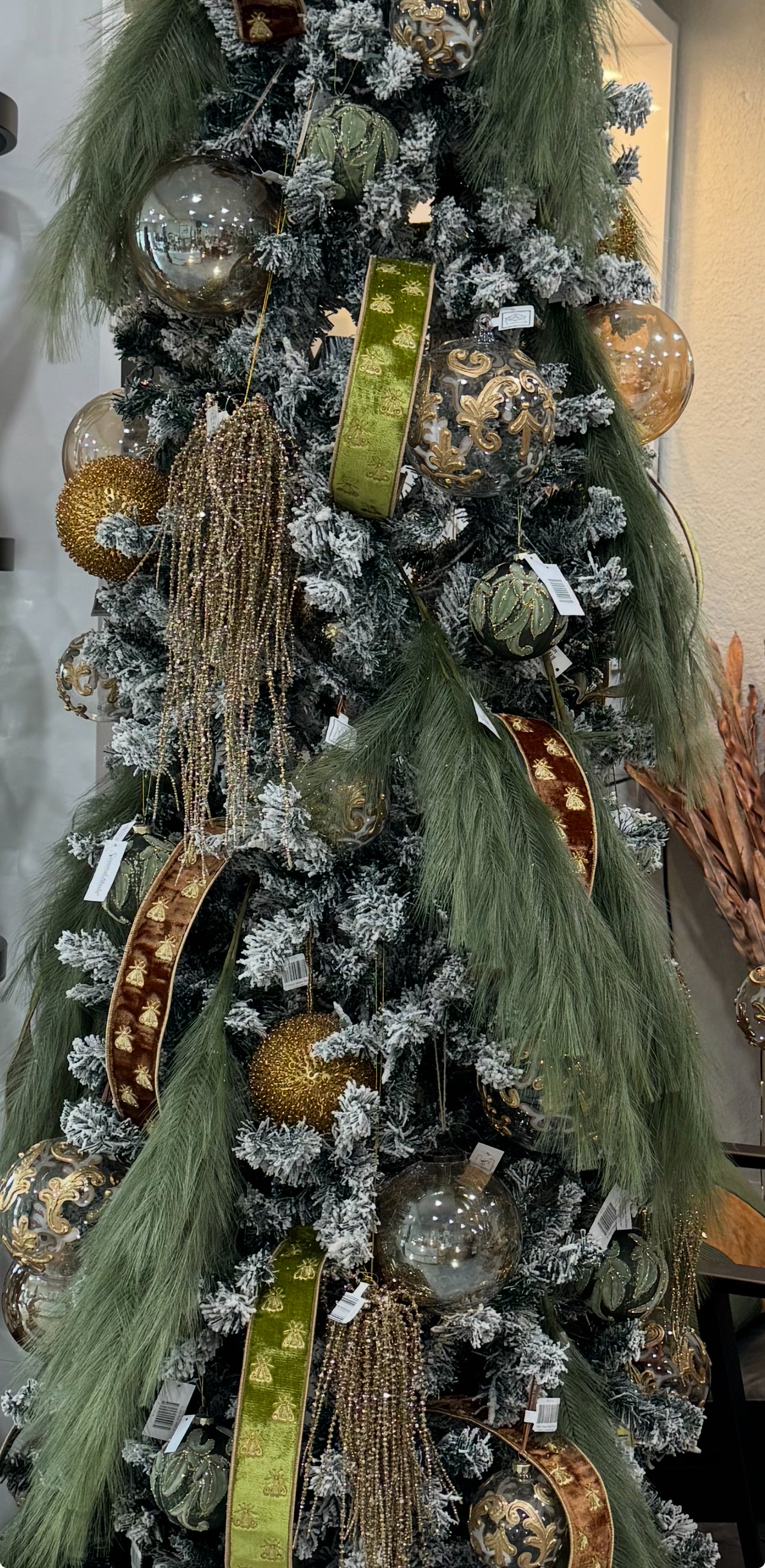 Bring a touch of glamour to your holiday decor with our 4" Sequin Beaded Ball Ornament in Gold. This exquisite ornament is adorned with shimmering sequins and beads that create a stunning sparkle, reflecting light beautifully.