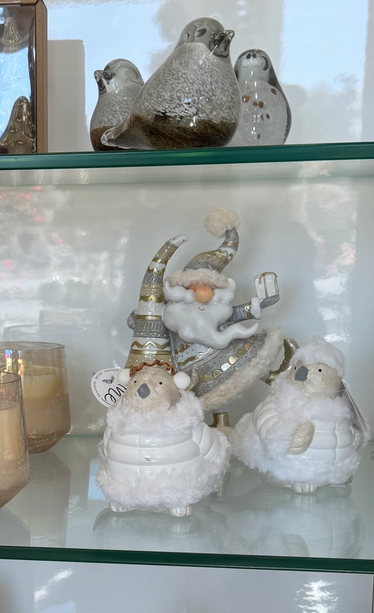 Bring festive cheer to your decor with our 9" Gray and Gold Santa Tree. This charming piece features a whimsical design that combines soft gray hues with elegant gold accents, creating a delightful focal point for your holiday displays.