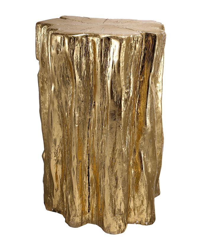 The Golden Tree Trunk Stool features the natural texture of real wood in a bright, modern gold finish for a chic look. Feature this piece in a modern living room, eclectically-decorated office, or a master bedroom for a gleaming accent piece. with its durable construction, this stool makes a stunning, versatile addition to any home.