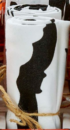 Bat towel tied with twine on a wooden surface