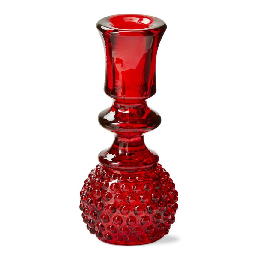 The candle holder features a unique reversible design, with one side for tea lights and the other side for taper candles. It is made from high-quality glass, which is durable and easy to clean.