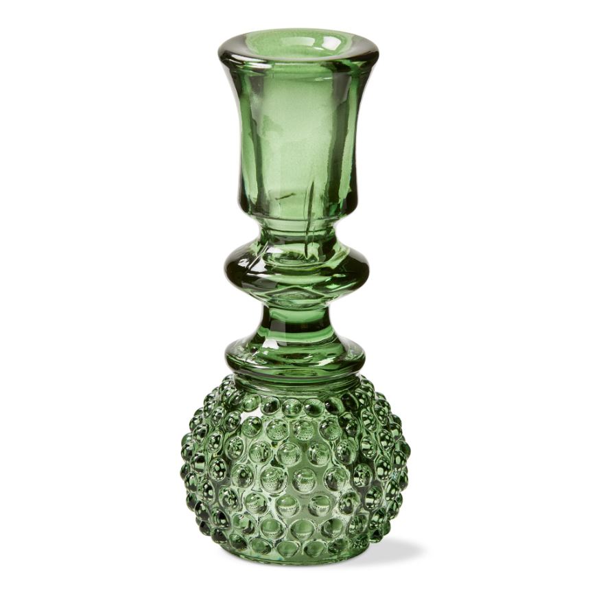 The candle holder features a unique reversible design, with one side for tea lights and the other side for taper candles. It is made from high-quality glass, which is durable and easy to clean.