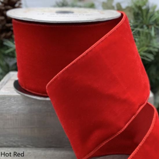 Measuring 1" wide and 10 yards long, this vibrant ribbon features a plush velvet front that exudes luxury and a coordinating dupion back for added texture. Perfect for gift wrapping, holiday decor, or crafting projects, its bold color and rich feel make it a stunning choice for adding a festive flair. Bring warmth and sophistication to your designs with this eye-catching hot red ribbon!