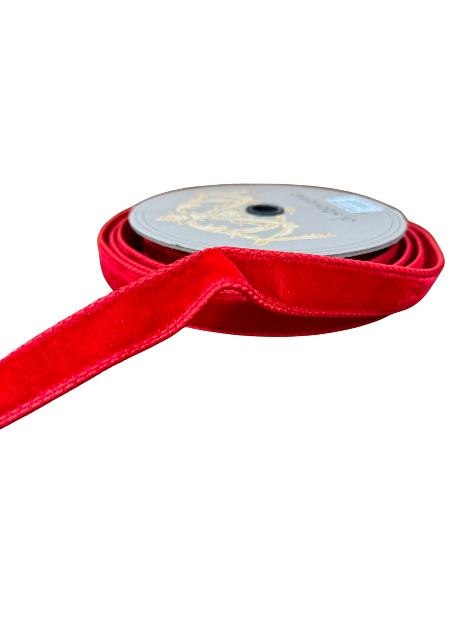 Hot Red Lush Velvet Dupion Back Ribbon. Measuring 1" wide and 10 yards long, this vibrant ribbon features a plush velvet front that exudes luxury and a coordinating dupion back for added texture. Perfect for gift wrapping, holiday decor, or crafting projects, its bold color and rich feel make it a stunning choice for adding a festive flair. Bring warmth and sophistication to your designs with this eye-catching hot red ribbon!