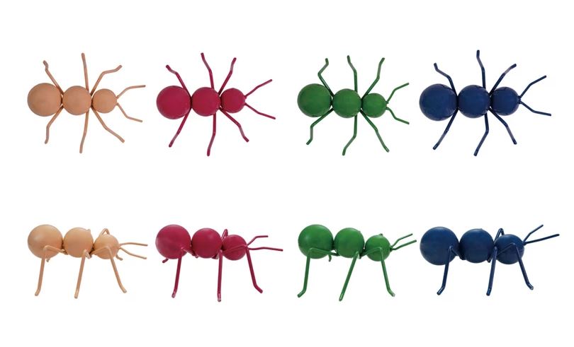 Metal ants in various colors including beige, pink, green, blue, and yellow, each with a whimsical decorative design.