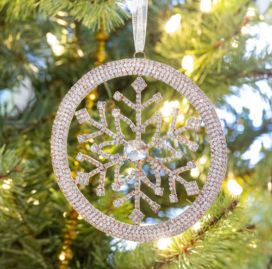 This exquisite piece features a delicate snowflake design in a stunning rose gold finish, creating a warm and festive glow that beautifully complements your Christmas tree. The intricate detailing adds a touch of elegance, making it a perfect accent for both traditional and modern decor styles. Hang it as a standout ornament or use it to enhance your holiday displays—this versatile wreath ornament will bring a unique sparkle to your seasonal festivities, ensuring your home feels cozy and inviting.