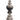 Decorative finial with intricate design on a white background